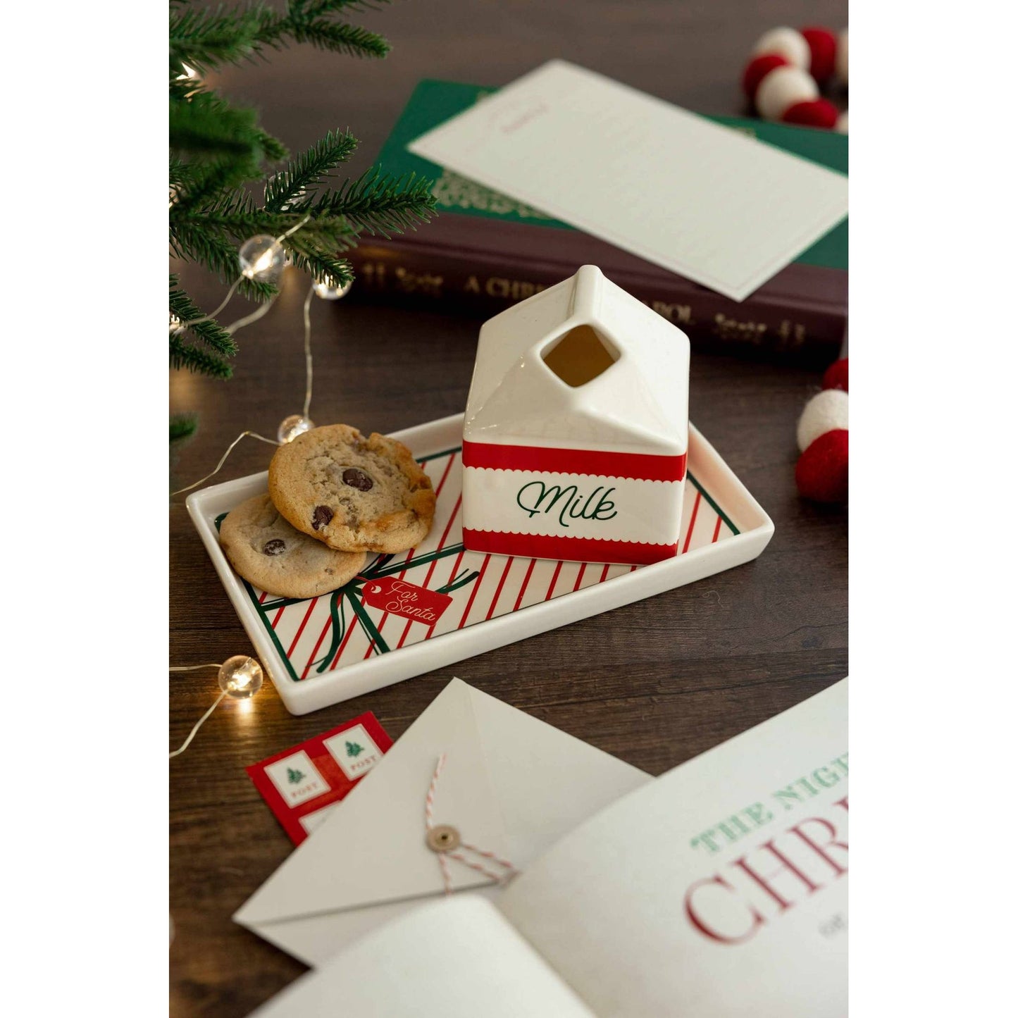 Ceramic Milk and Cookies Set with festive bow design on cookie tray and milk jug for Christmas Eve traditions