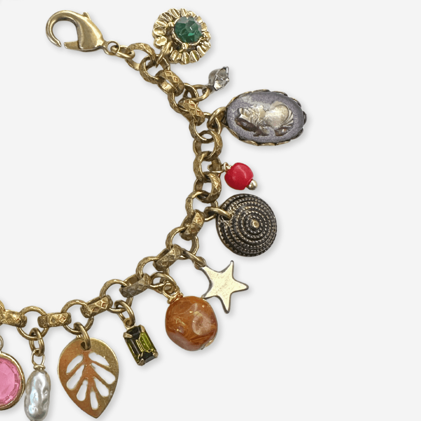 
                  
                    Repurposed vintage mixed charm bracelet - Curated Home Decor
                  
                