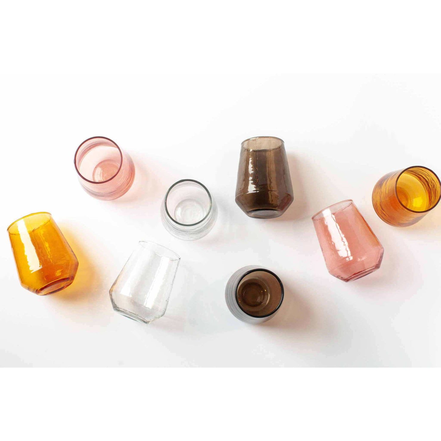 
                  
                    A pair of amber handblown hammered glass water tumblers. - Curated Home Decor
                  
                