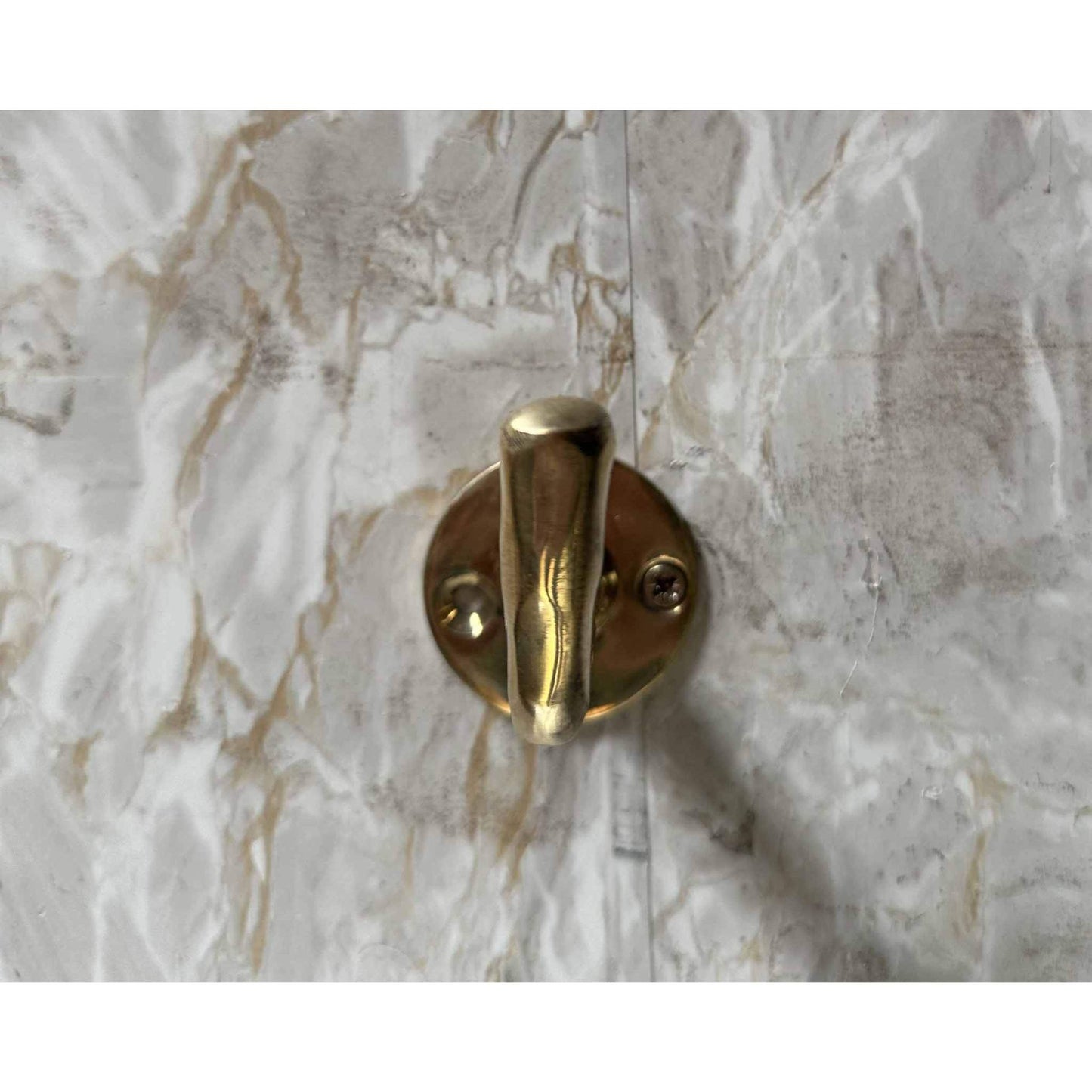Solid brass wall mounted bathroom hooks with antique brass finish and vintage design