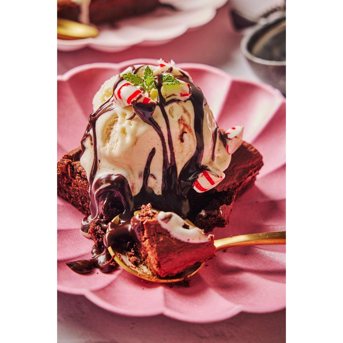 Coop's Mini Peppermint Hot Fudge drizzled on ice cream and brownie with peppermint pieces