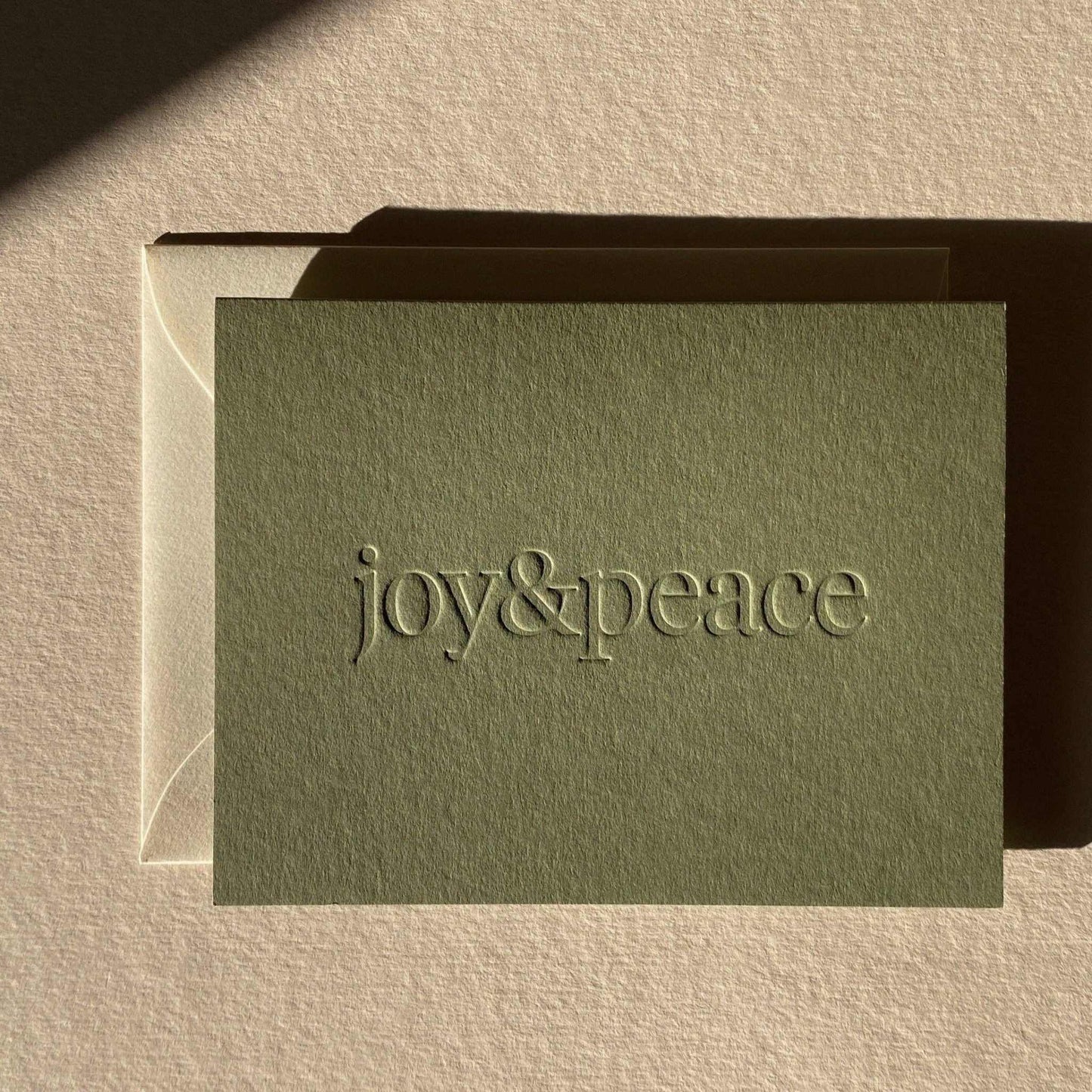 Joy & Peace olive folded card with blind deboss and natural envelope