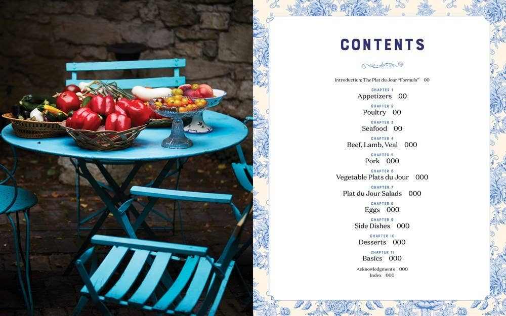 Plat du Jour cookbook with French dinner recipes and fresh vegetables on a blue outdoor table