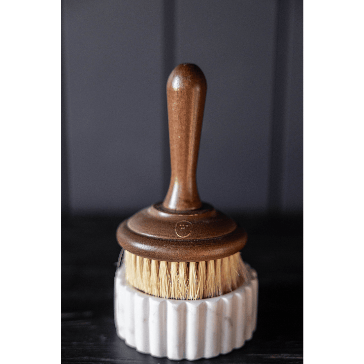 White marble fluted soap dish with elegant veining and fluted edges for bathroom or kitchen use