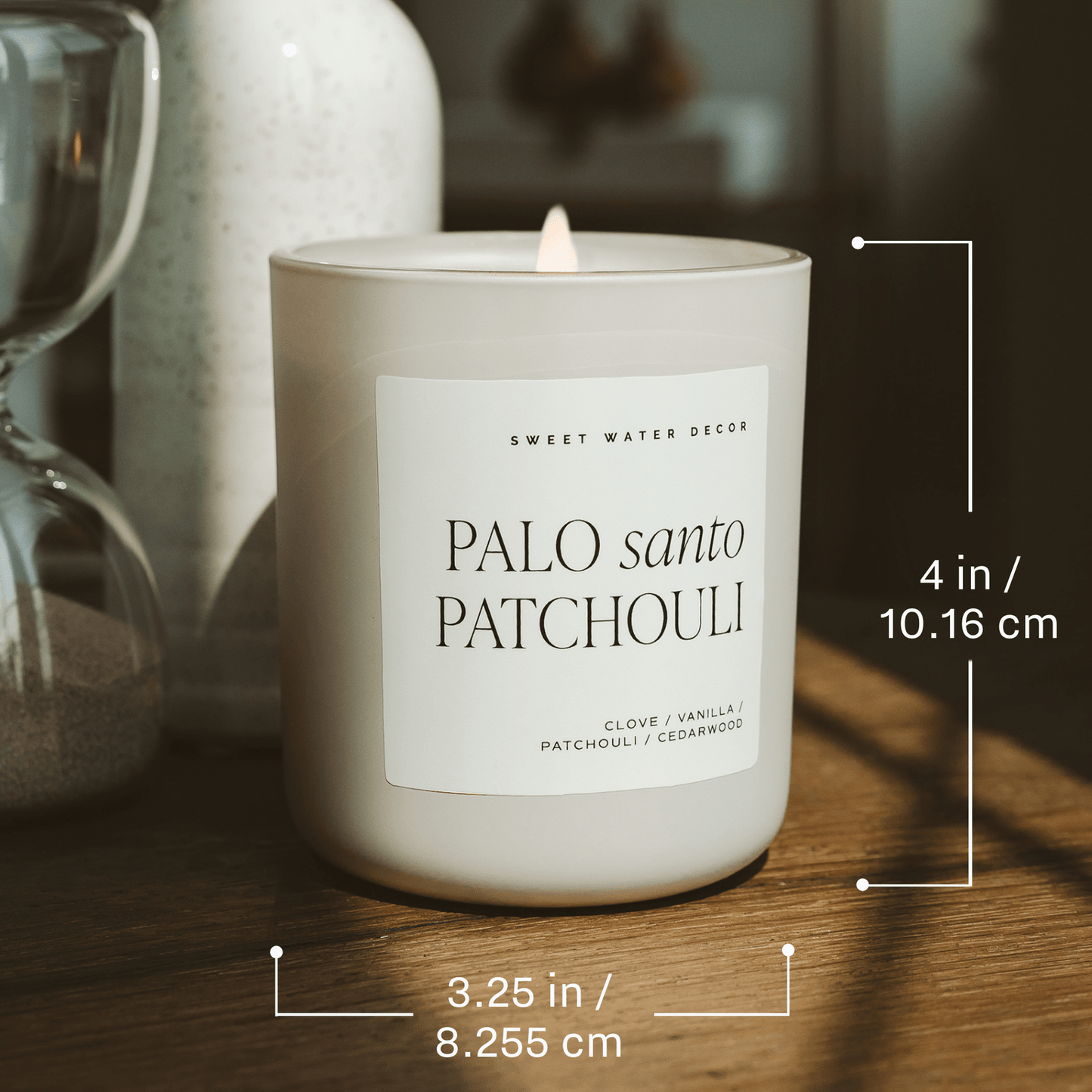 
                  
                    Apple Maple Bourbon 15 oz soy candle with fall-inspired apple, maple, bourbon, and vanilla scent in a white jar with wood lid
                  
                