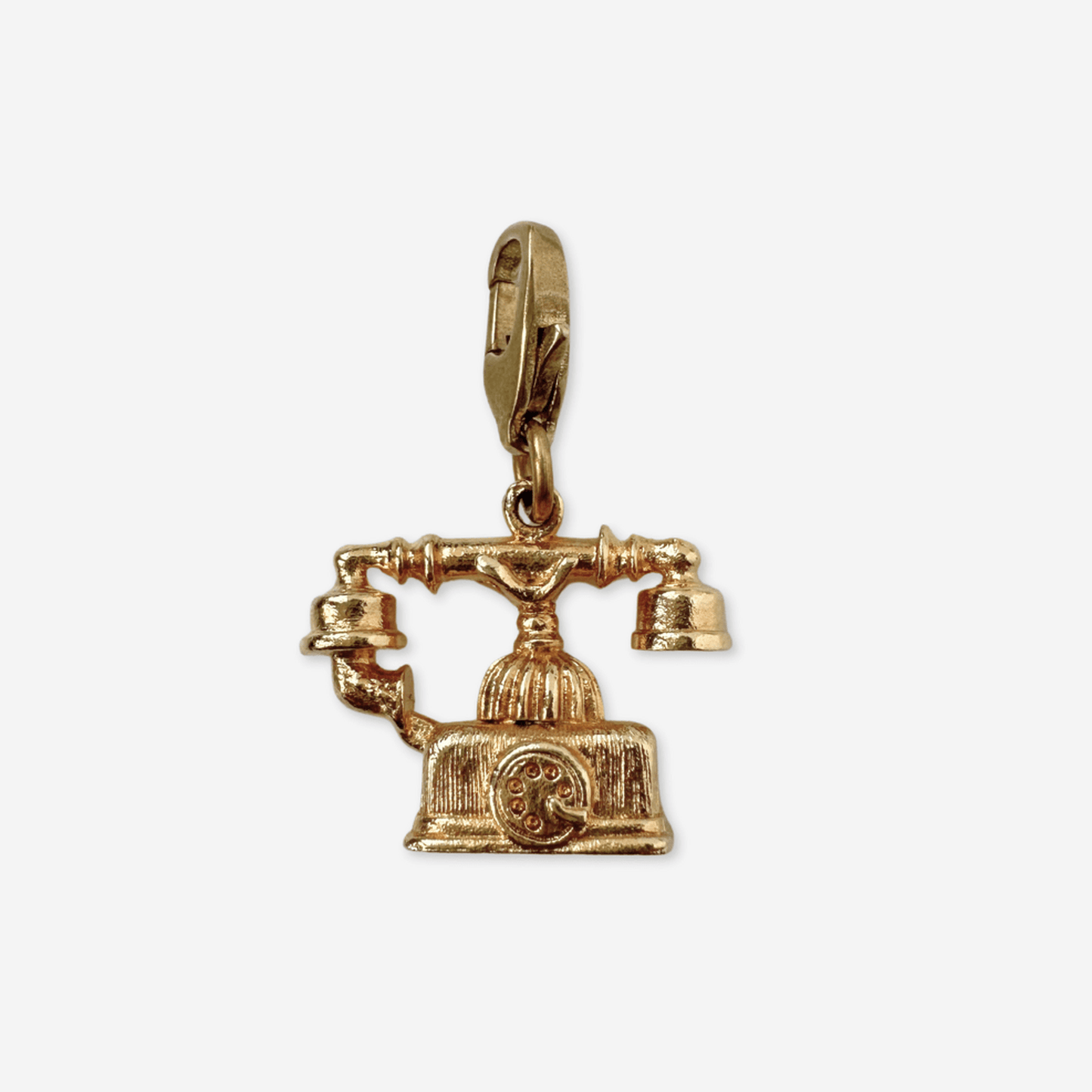 Small vintage gold rotary phone charm with raw brass lobster clasp