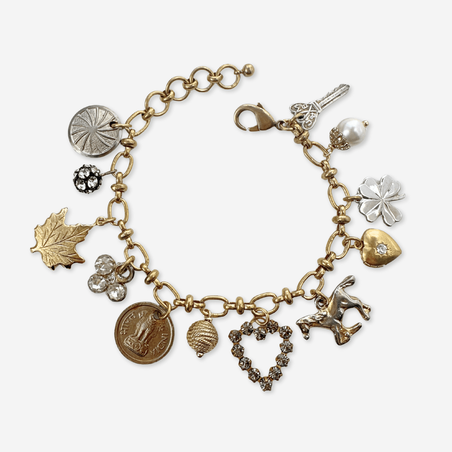 Repurposed vintage mixed metal charm bracelet with brass chain and lobster clasp