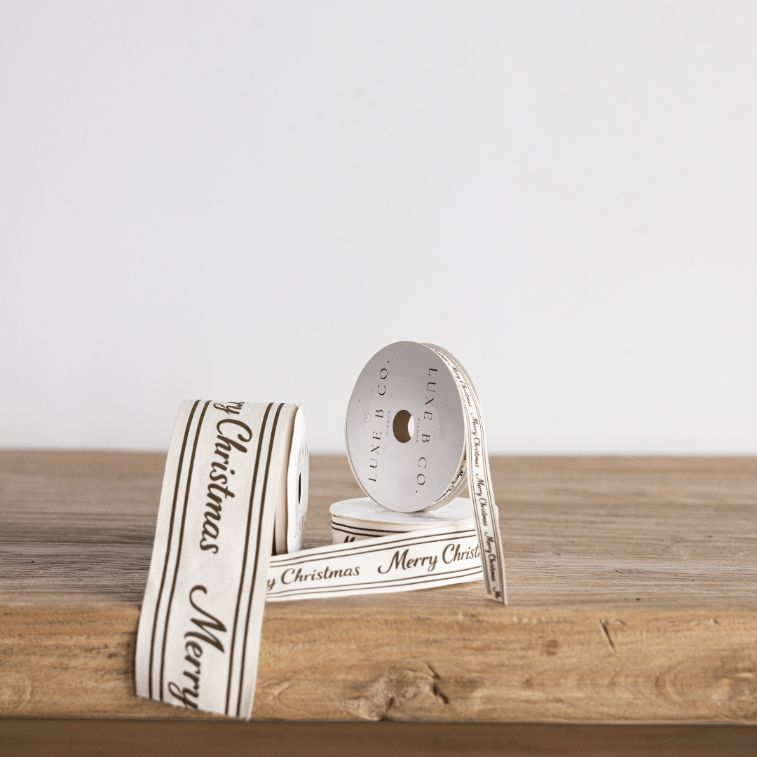 
                  
                    Olive Cursive Merry Christmas Ribbon, 2" (Pre-Order: Ships Late September) - Curated Home Decor
                  
                