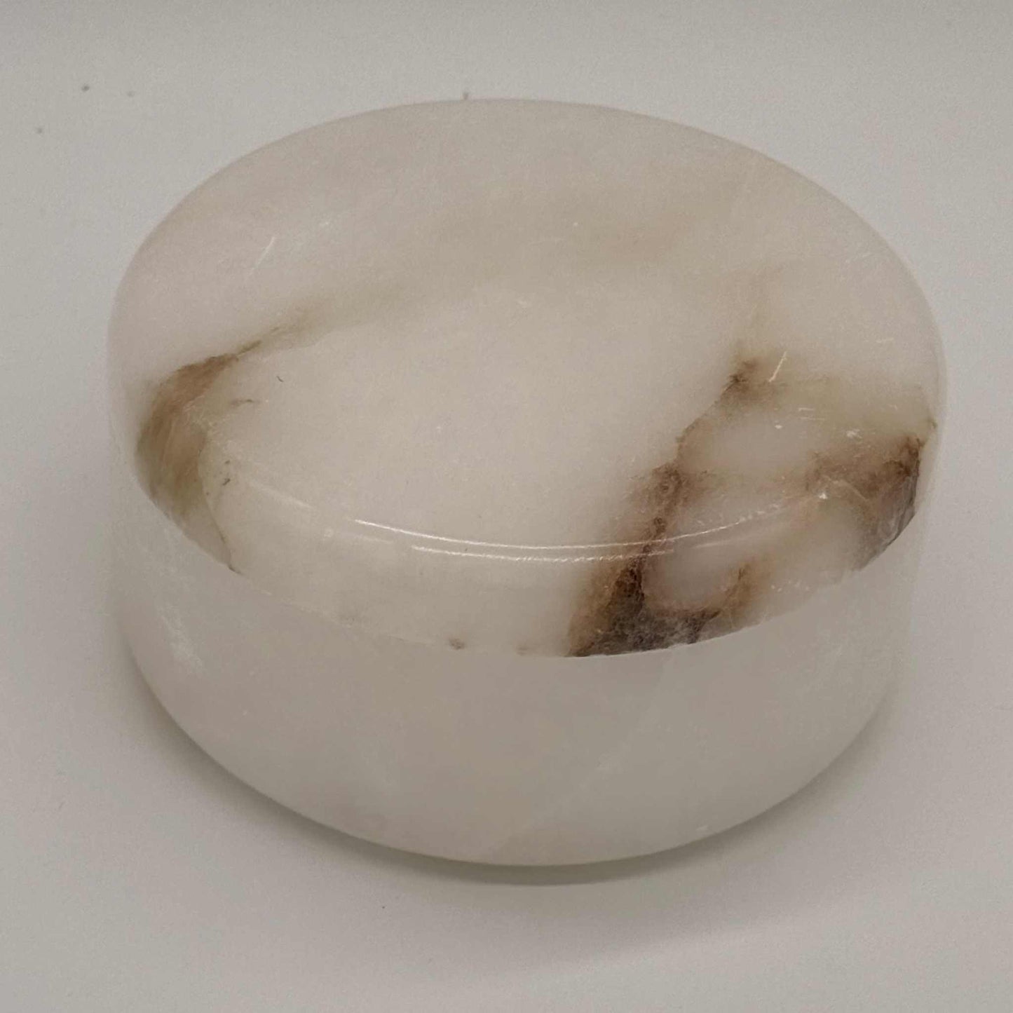 Alabaster lidded round box 6-inch diameter with natural veining and elegant white finish