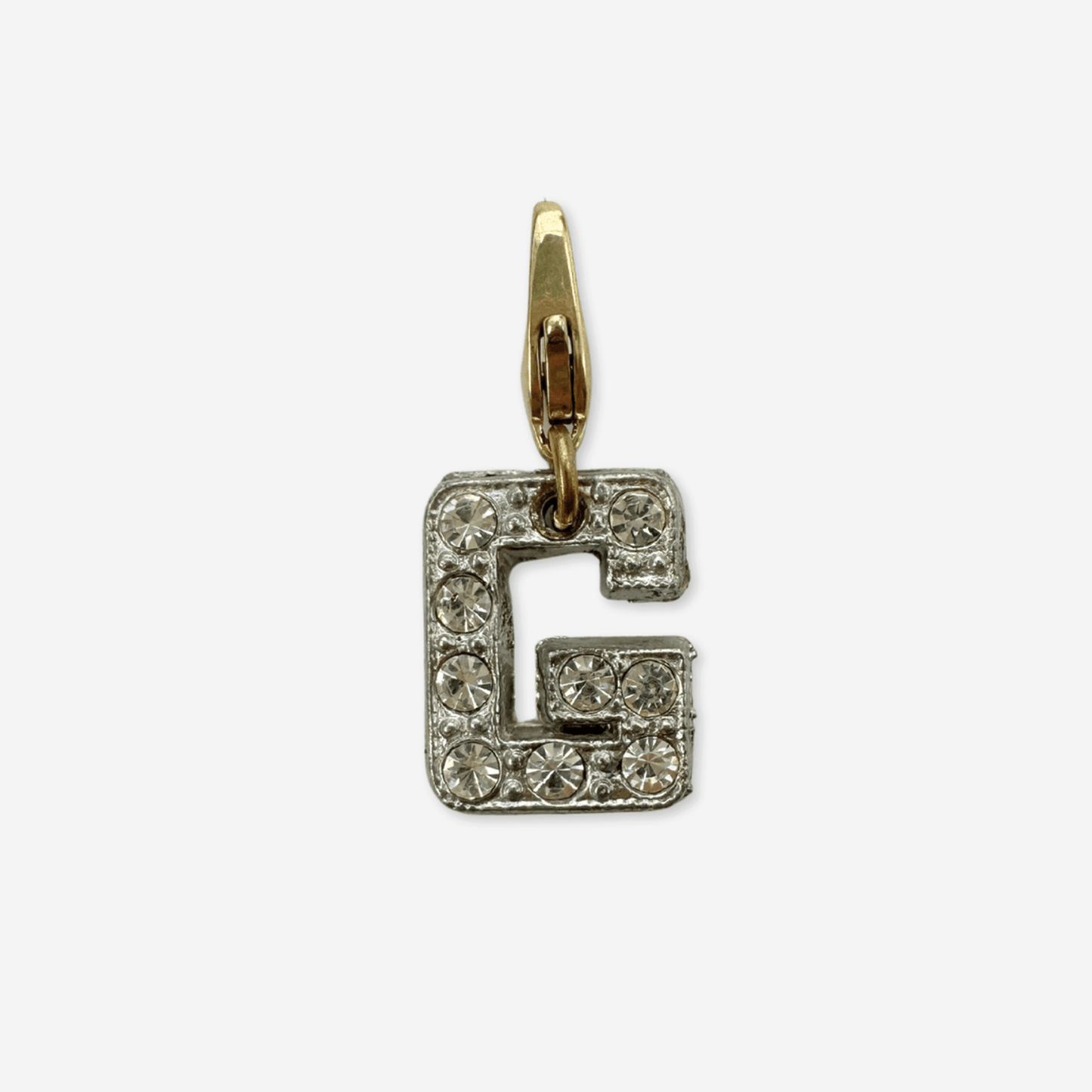 Small vintage clear rhinestone letter G charm with silver tone setting and brass lobster clasp