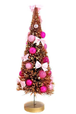 Large pink Tinsel Town Tree decorated with pink ornaments and bows on a gold base