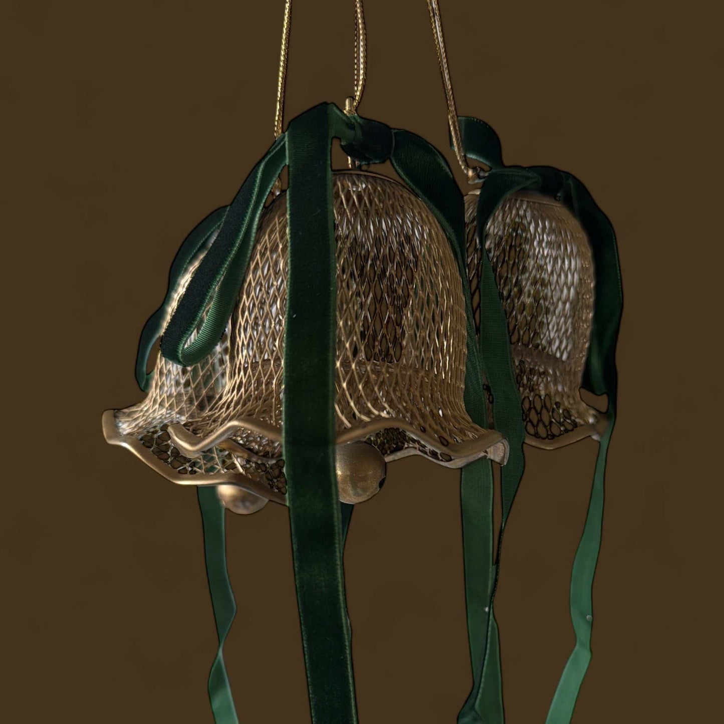 Vintage gold bell with green velvet ribbons hanging decoration