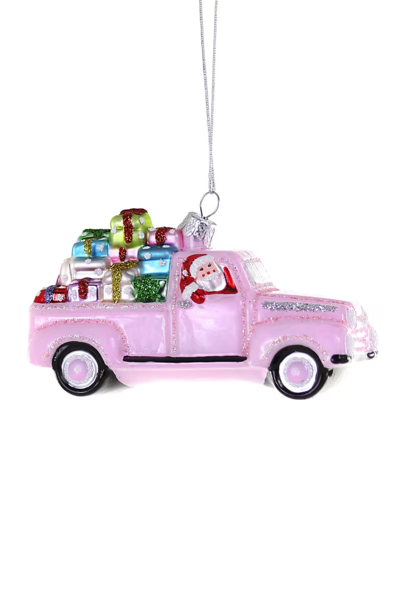 Holly Jolly Delivery pink glass truck ornament with Santa and colorful holiday gifts