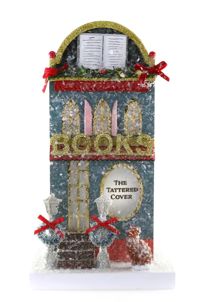 Vintage-inspired lightweight cardboard bookshop decoration with glitter and festive accents for indoor shelf or mantel display