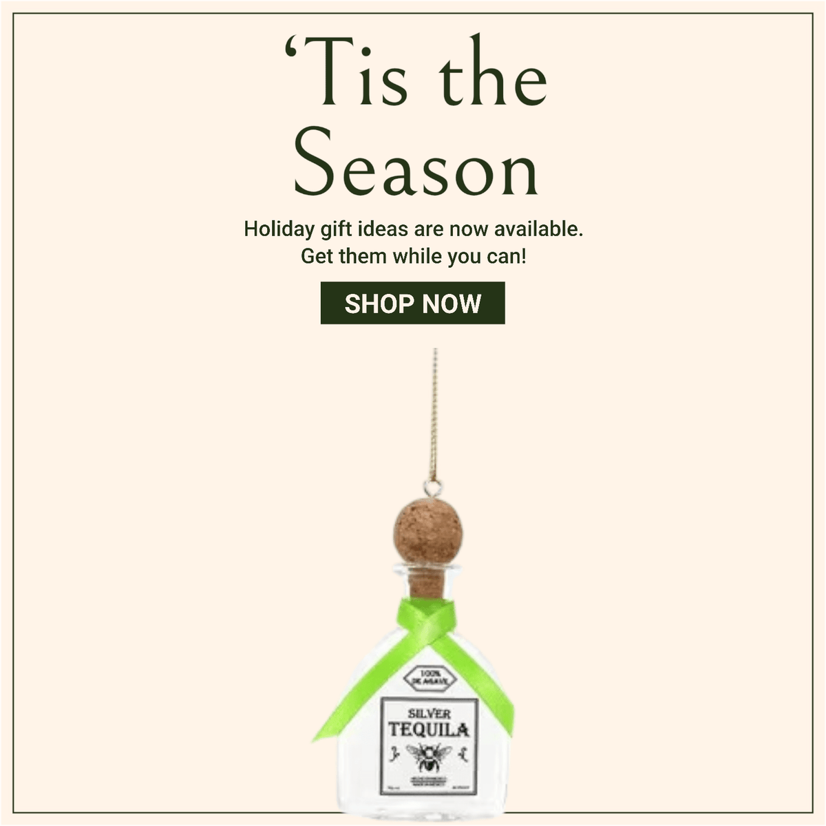 
                  
                    Glass tequila bottle ornament with festive green ribbon for holiday decor
                  
                
