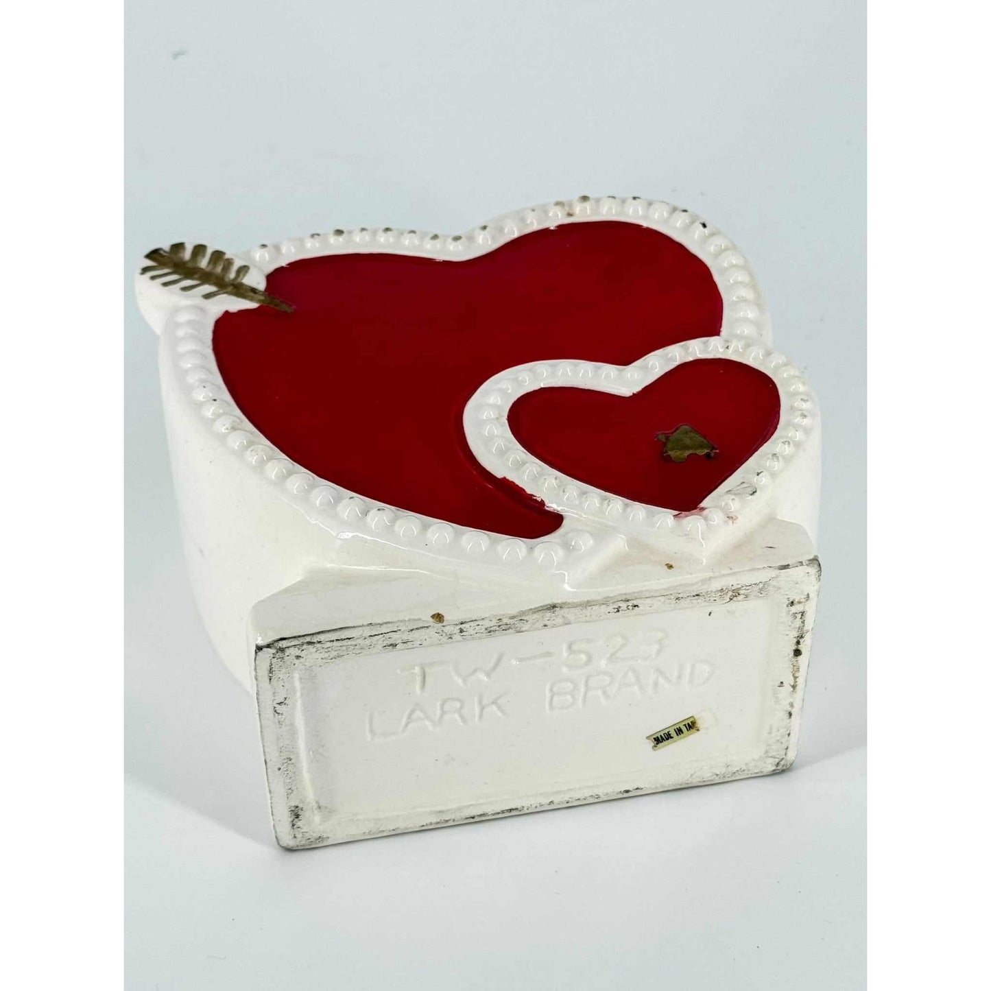 Vintage Heart Vase by Lark Brand with red heart design and white border, decorative and gift-friendly.