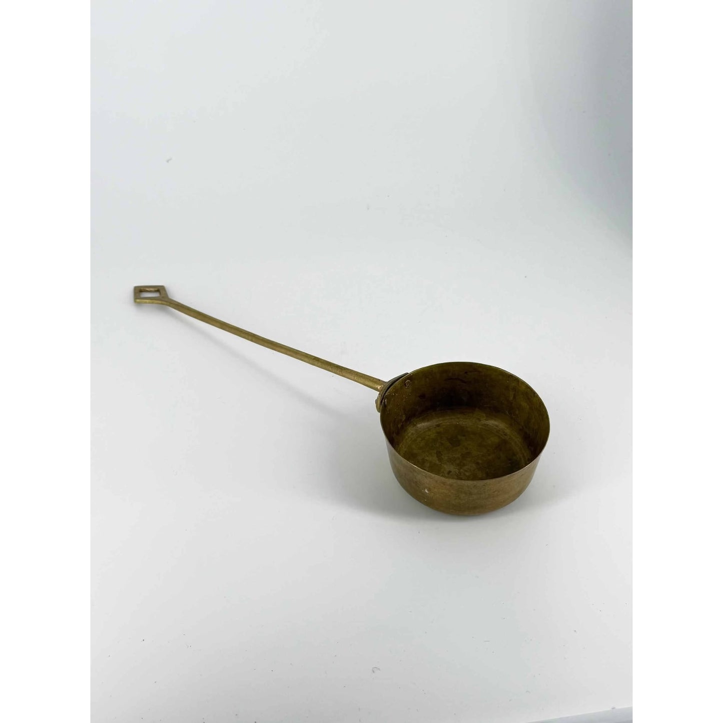 
                  
                    Vintage brass ladle 12-inch antique brass serving spoon with 4-inch bowl and decorative design
                  
                