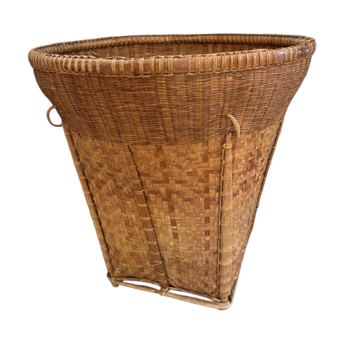 Vintage handwoven rattan basket with tapered silhouette and natural patina