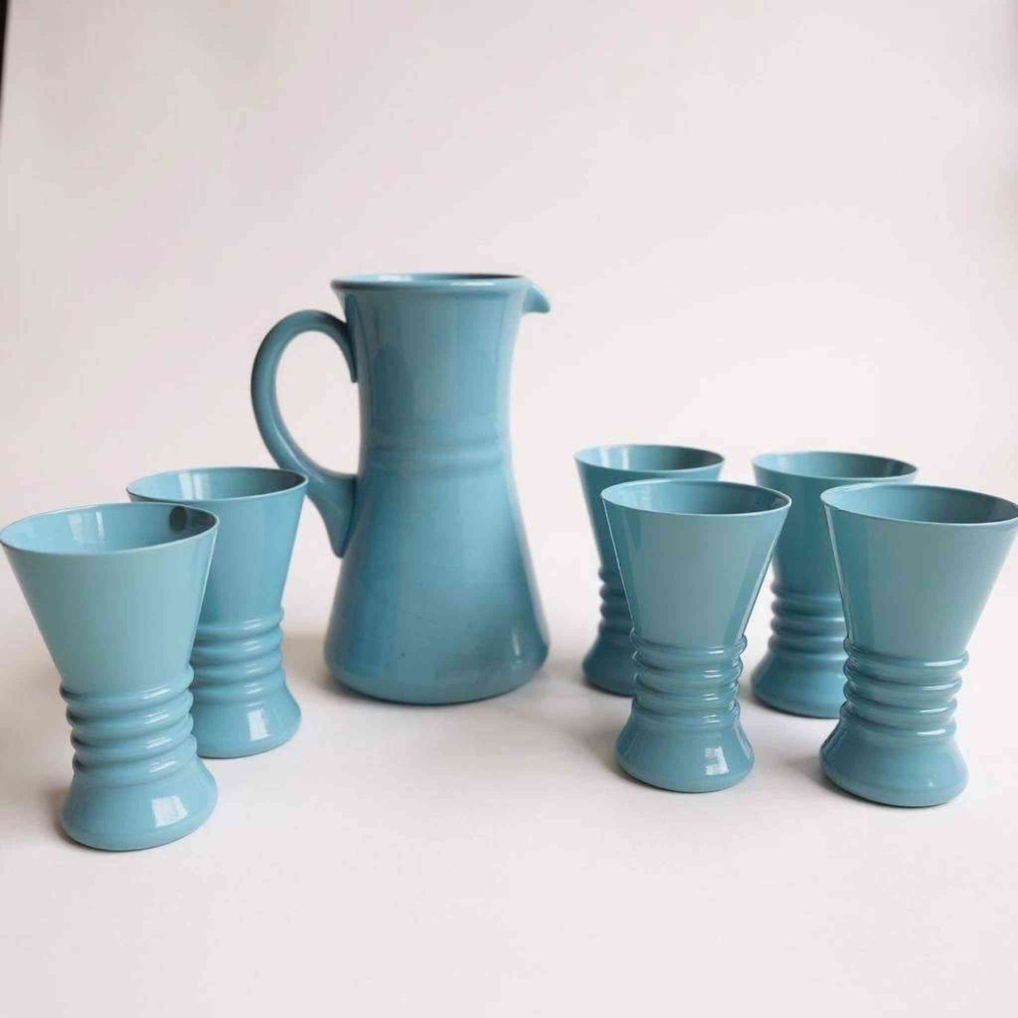 
                  
                    Vintage Italian opaline glassware serving set in pale blue with 1 pitcher and 5 glasses
                  
                