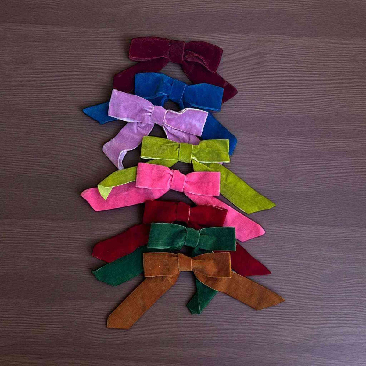 
                  
                    Set of 8 colorful velvet bow ornaments for holiday decoration
                  
                