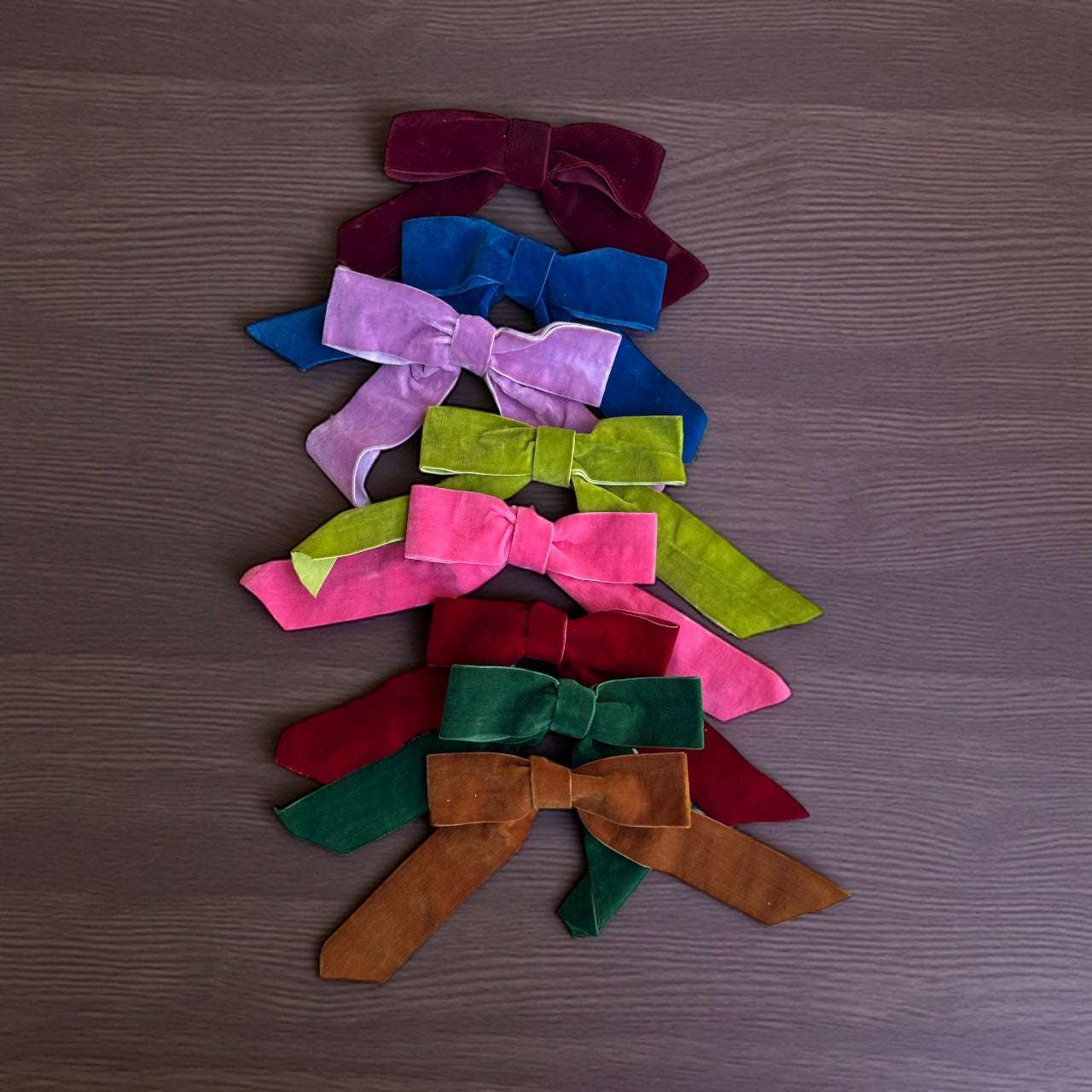 Boxed set of 8 colorful velvet bow ornaments for holiday décor