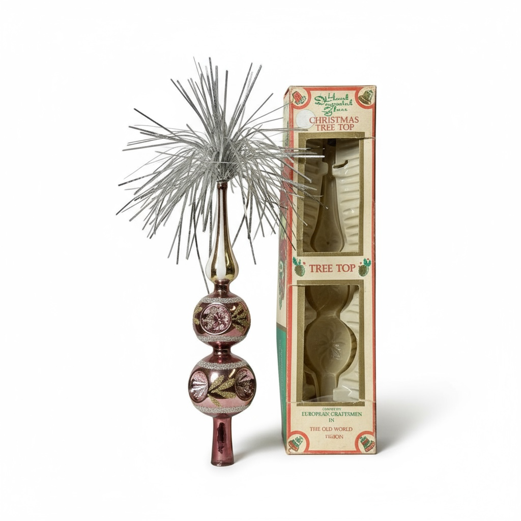 Vintage hand decorated glass tree topper with pink finish, gold detailing, and silver tinsel burst in original Commodore box