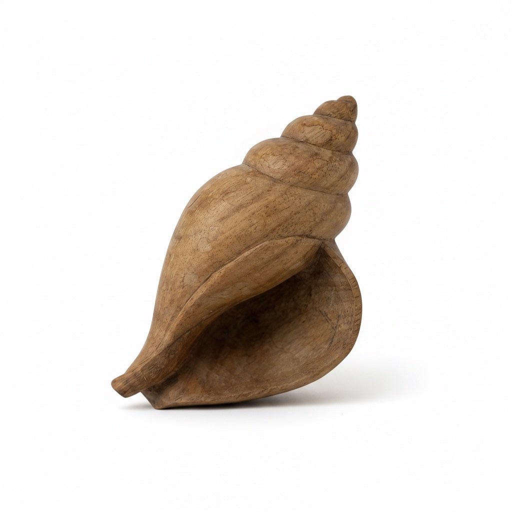 Hand-carved wooden shell decor in warm mango tones with vintage patina and natural wood variations.