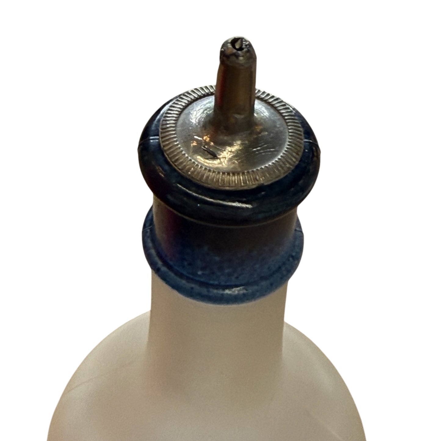 
                  
                    Close-up of a bottle cap with a white background
                  
                