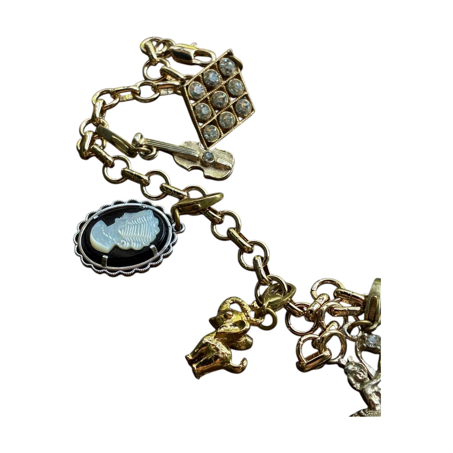 
                  
                    Vintage Gold-Tone Charm Bracelet — Ballerina, Elephant, Cameo & Violin Charms - Curated Home Decor
                  
                