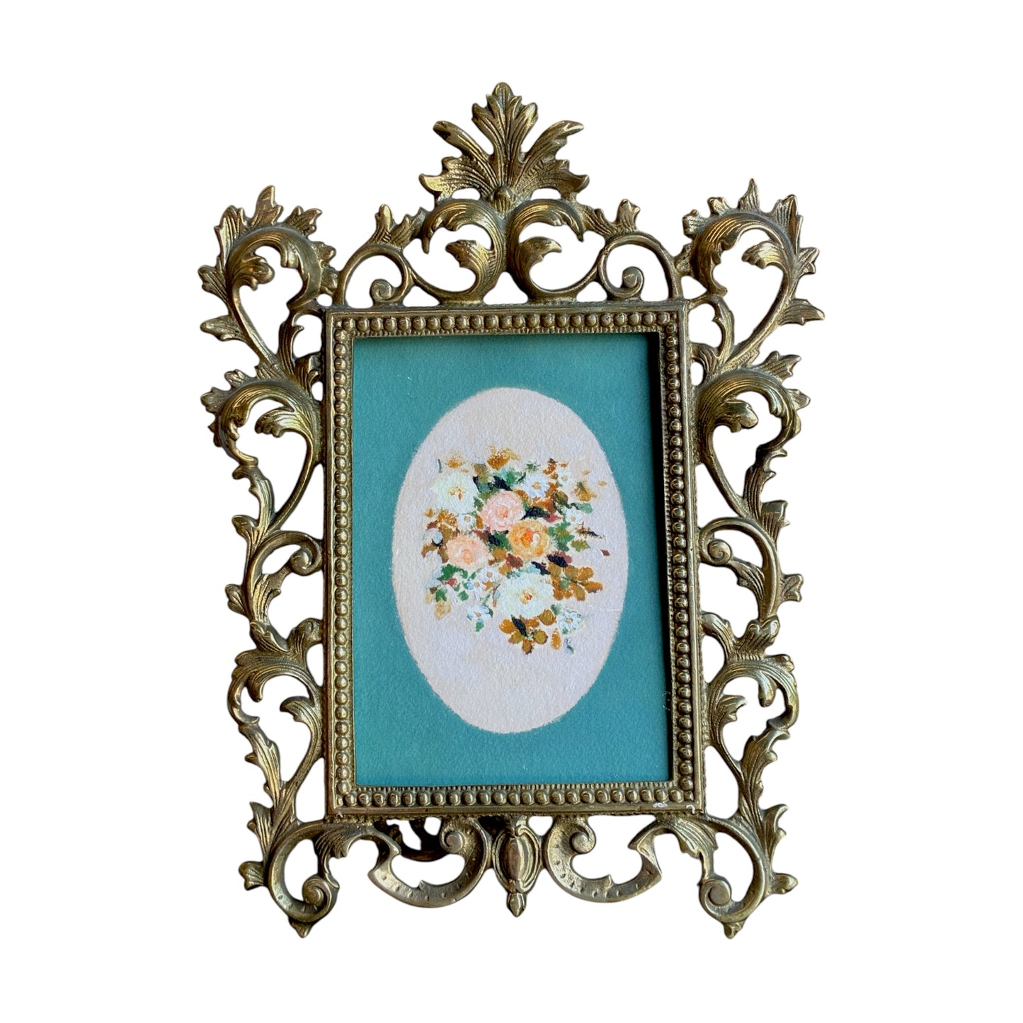 
                  
                    Ornate gold picture frame with simple artwork shown inside, on white backgroun
                  
                