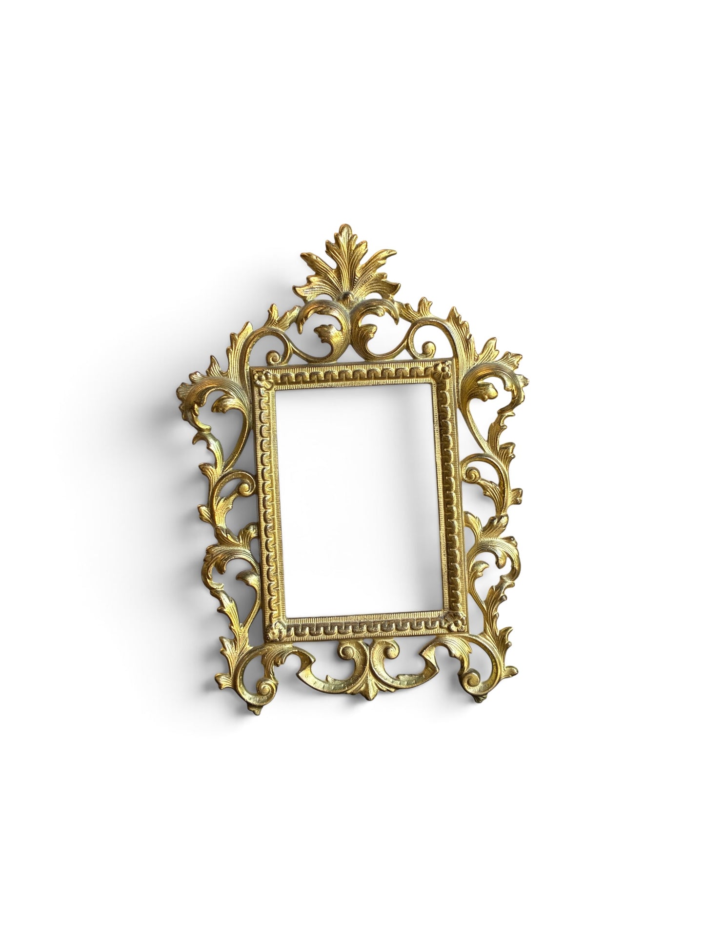 
                  
                    Ornate gold photo frame on white background
                  
                