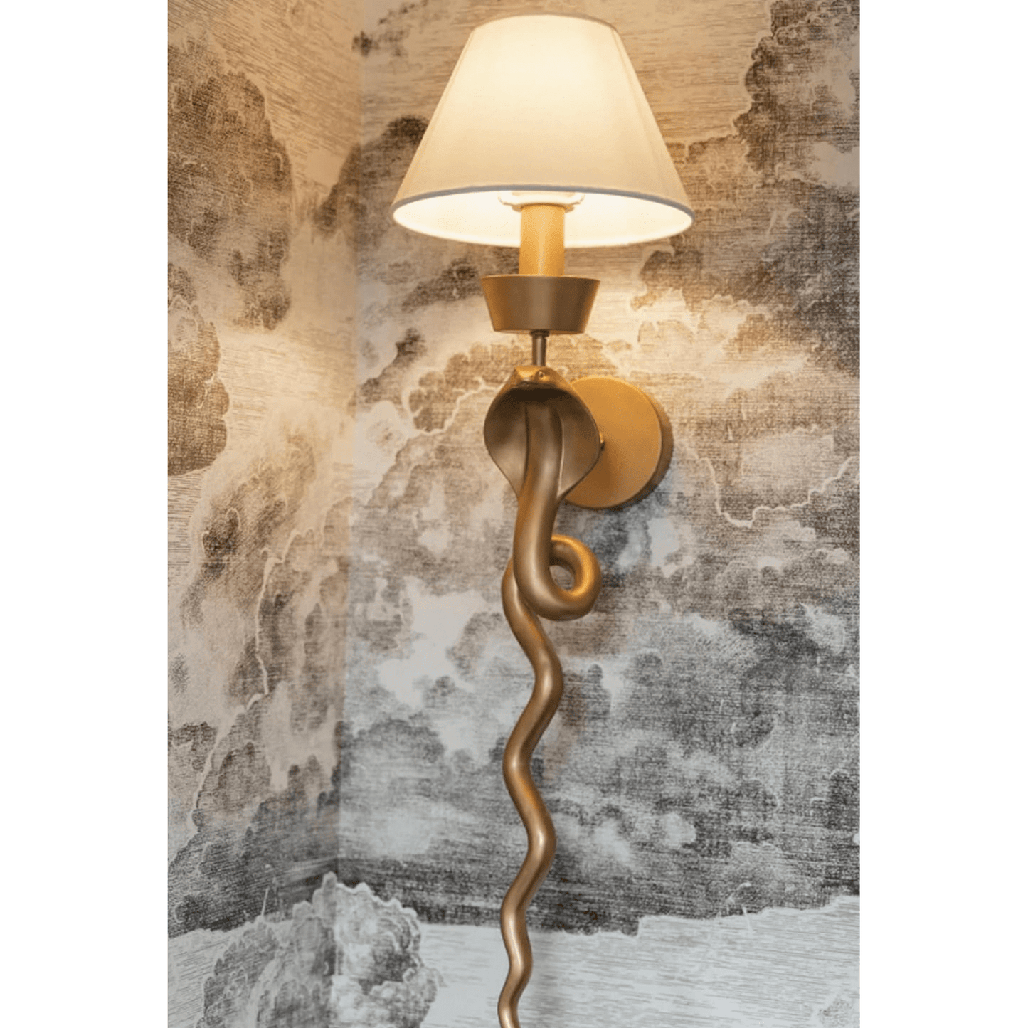 Gold serpent snake sconce wall light with black linen shade and sculptural design