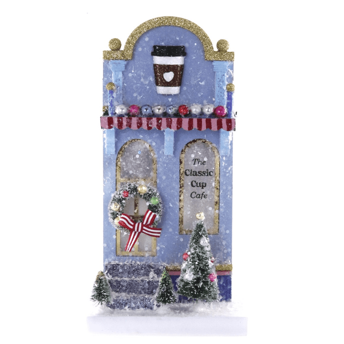 The Classic Cup Café cardboard holiday house with vintage decor and Christmas village scene