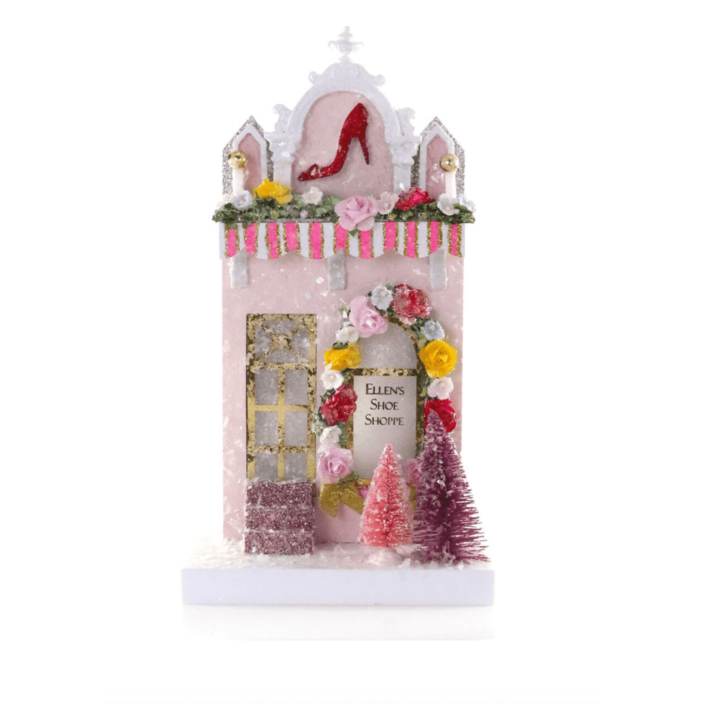 Ellen's Shoe Shoppe vintage-style pink cardboard holiday house decoration with flowers and Christmas trees