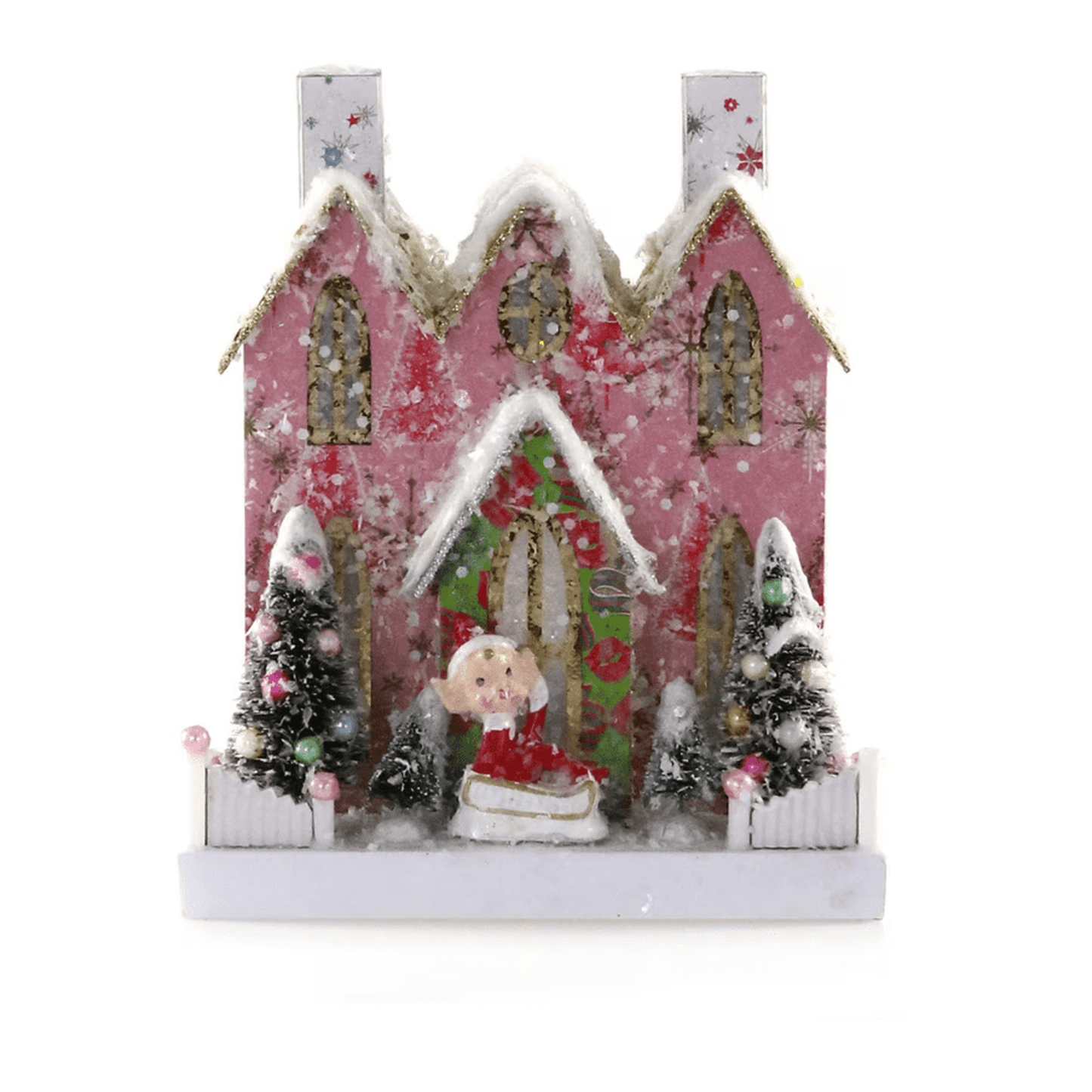 Retro Elf Abode vintage-inspired cardboard holiday house with elf figure and snowy trees decoration