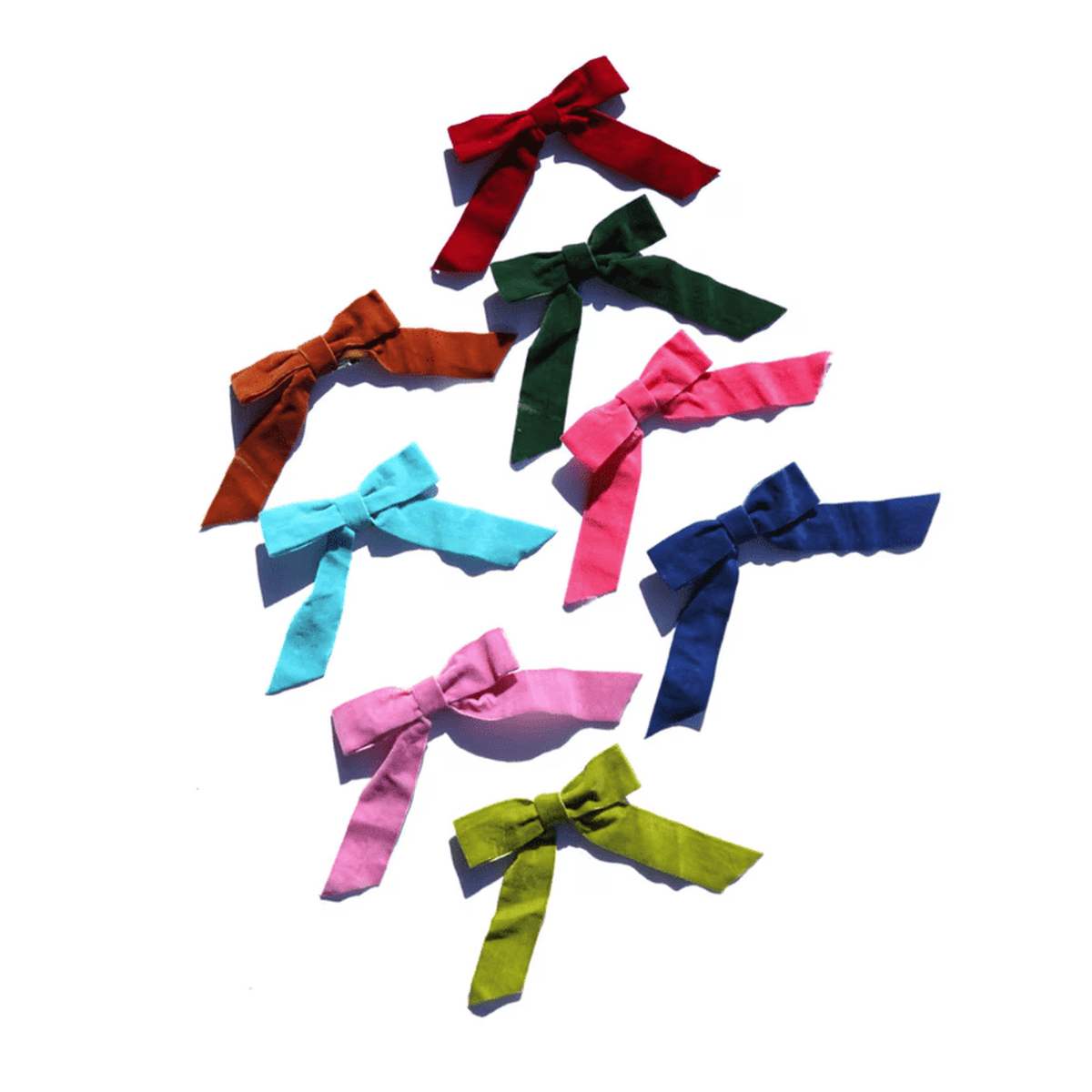 
                  
                    Set of 8 colorful velvet bow ornaments for holiday decor
                  
                