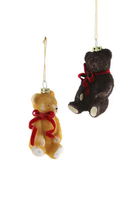 
                  
                    Hand-crafted vintage-style teddy bear ornaments in soft brown tones with red bows for Christmas tree decoration
                  
                