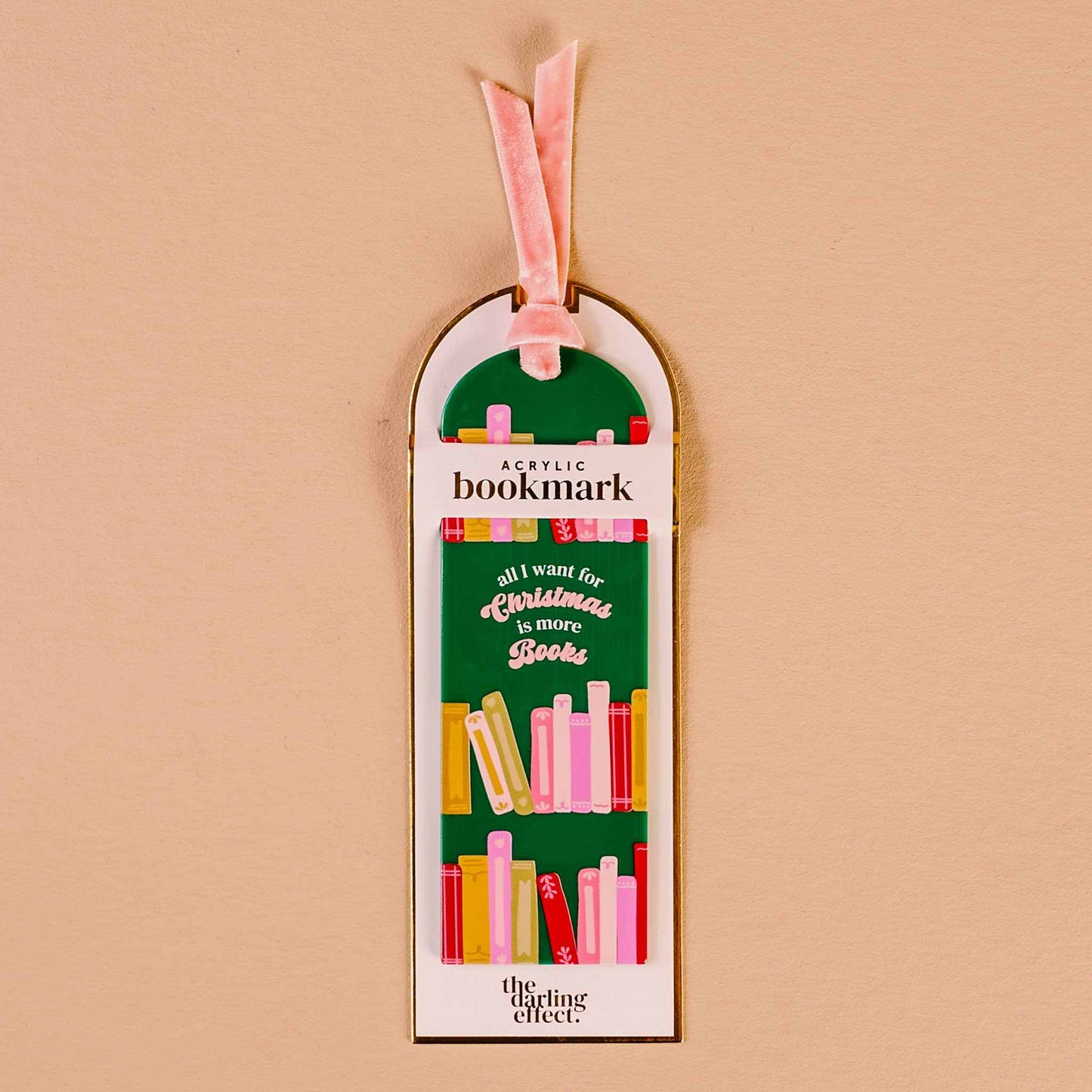 Colorful acrylic bookmark with velvet tassel and "All I want for Christmas is More Books" text
