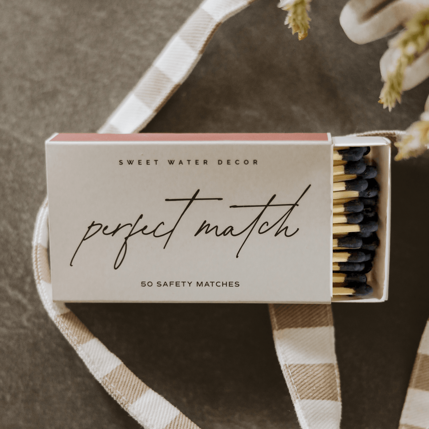 Box of Perfect Match Safety Matches with black tips and side strike pad for easy lighting