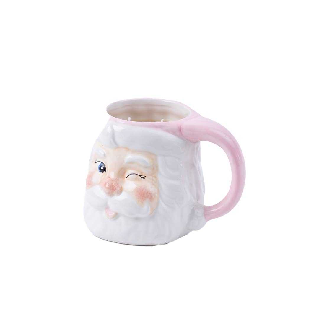 Sweet Grace Santa Mug candle in pink and white Santa face design with a handle, festive holiday decor