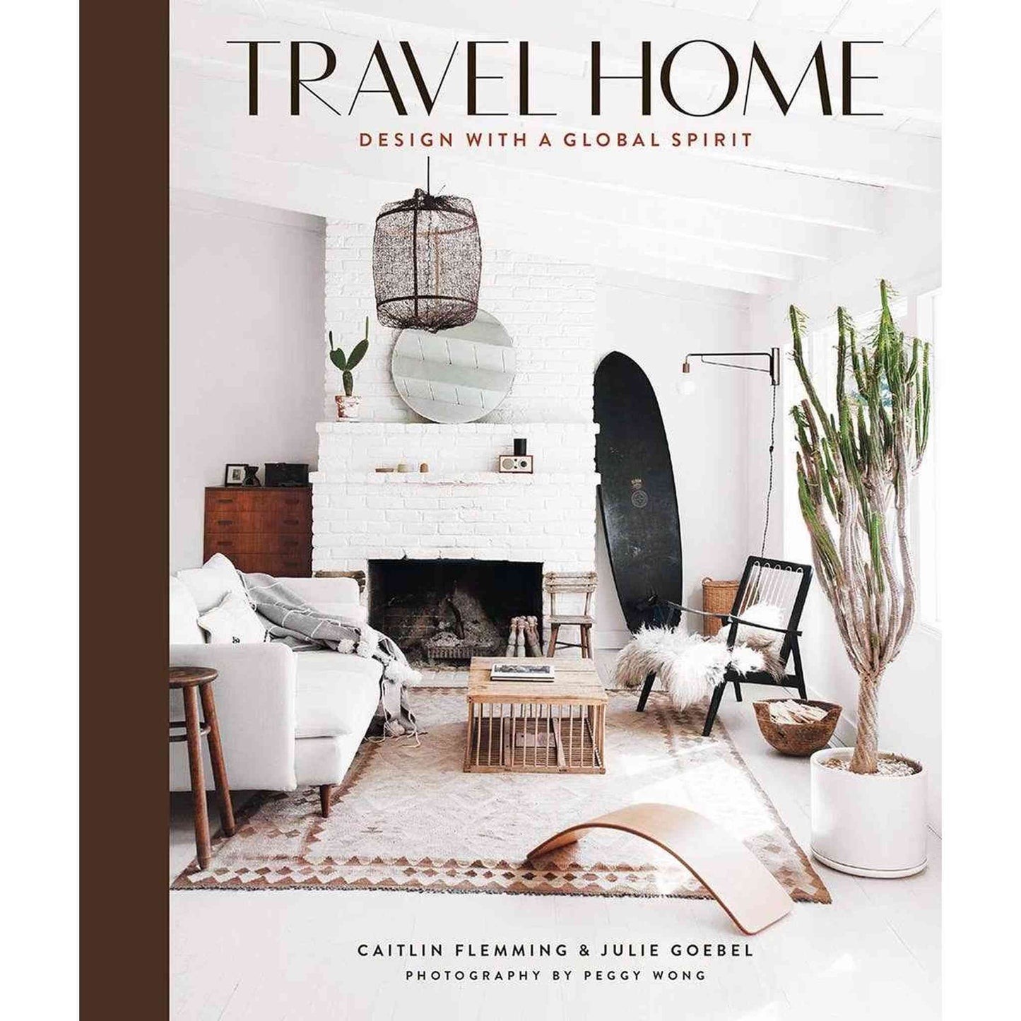 Travel Home book cover featuring a stylish living room with modern and global-inspired decor