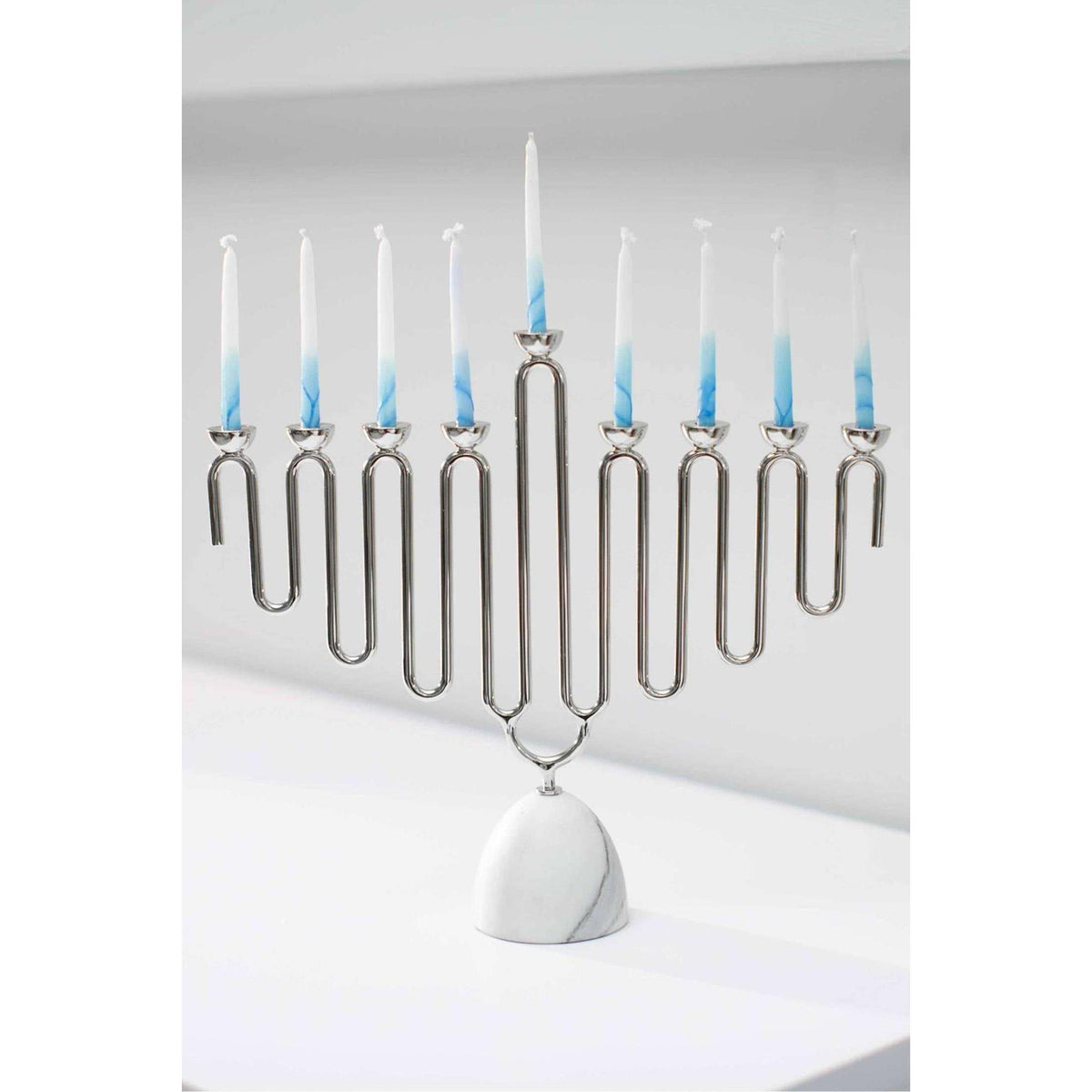 Modern Coluna Menorah crafted from Carrara Marble and silver nickel-plated metal with precise candle holders