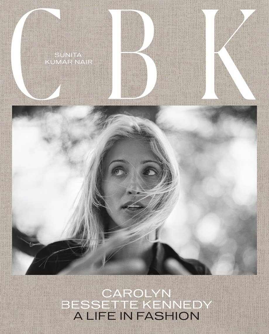 Carolyn Bessette Kennedy stylish portrait with iconic red lip and timeless fashion elegance