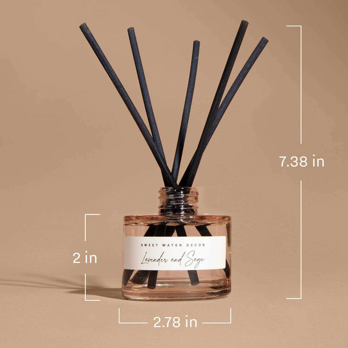 
                  
                    Hello Fall reed diffuser with beige glass jar and black reeds for autumn decor
                  
                