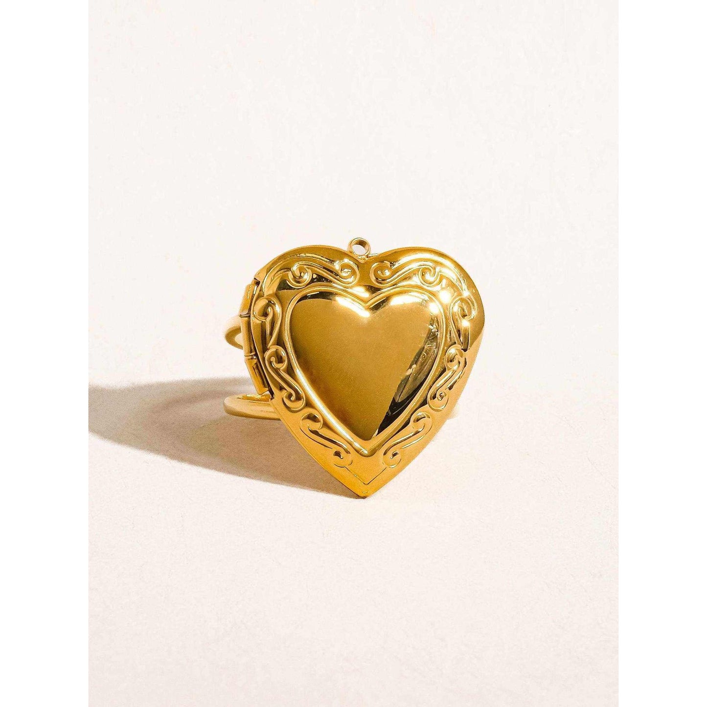 
                  
                    Sefina 18K Non - Tarnish Locket Heart Ring: Yellow Gold - Curated Home Decor
                  
                
