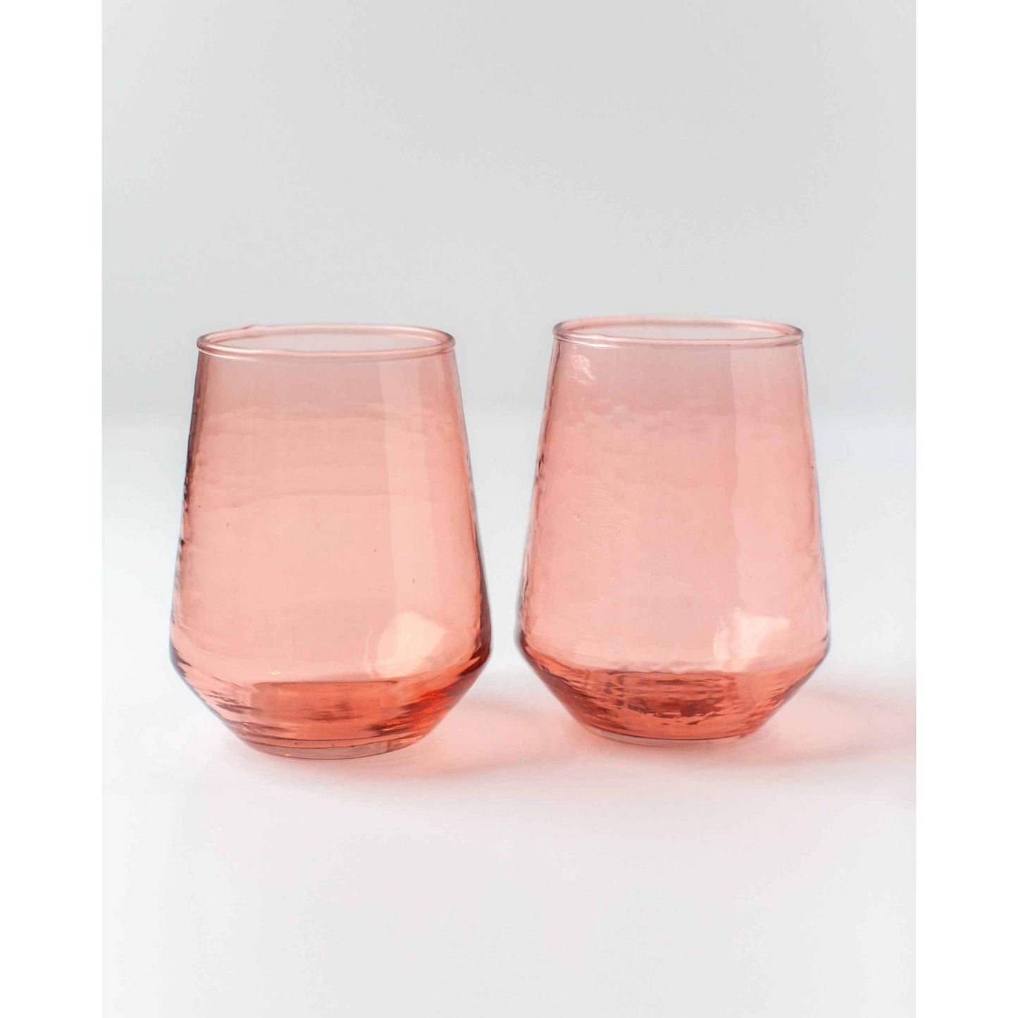 
                  
                    A pair of amber handblown hammered glass water tumblers. - Curated Home Decor
                  
                