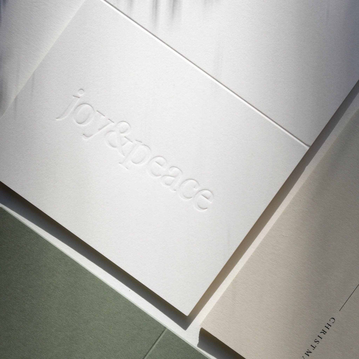 
                  
                    Joy & Peace No. 01 olive A2 folded card with blind deboss and natural envelope
                  
                