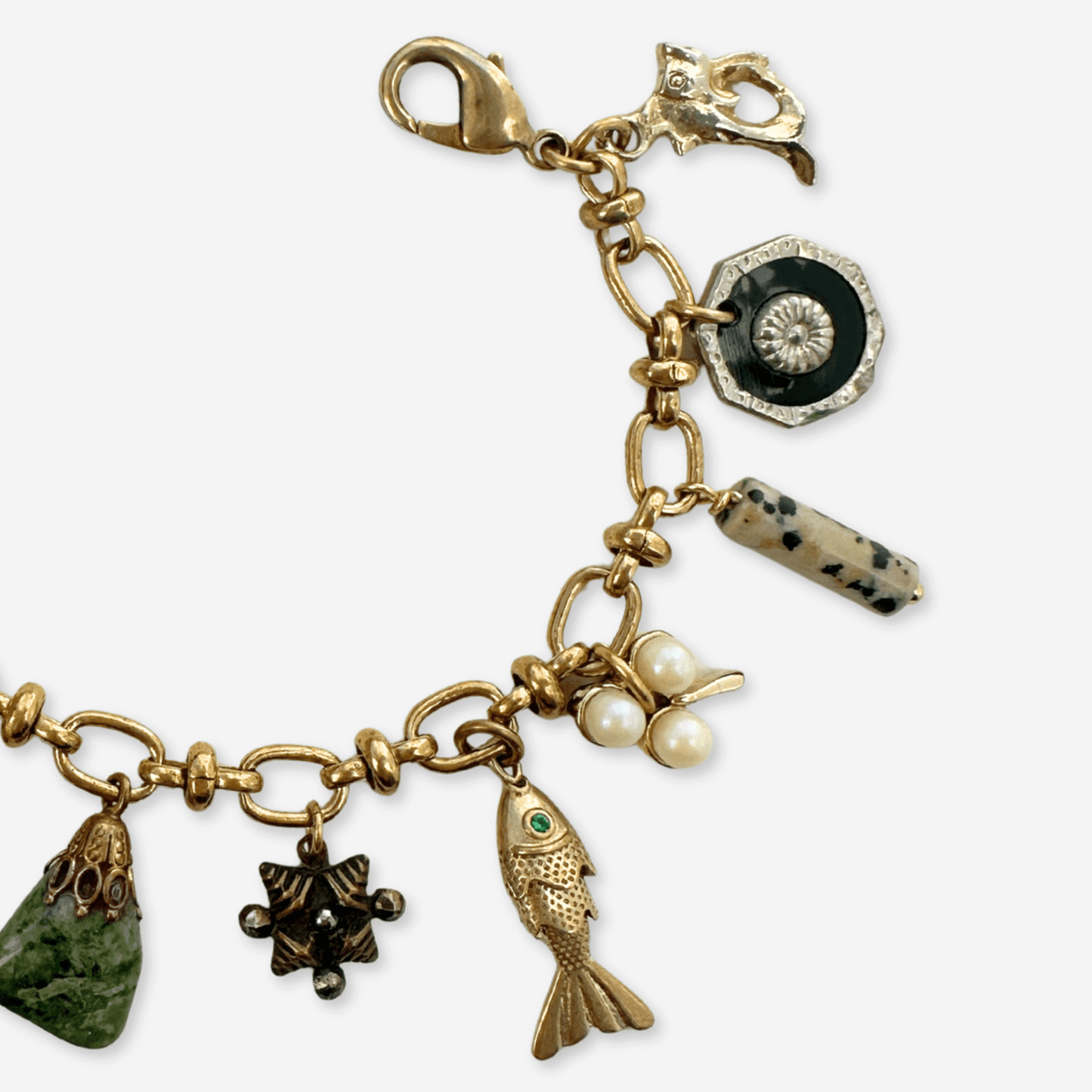
                  
                    Repurposed vintage mixed charm bracelet - Curated Home Decor
                  
                