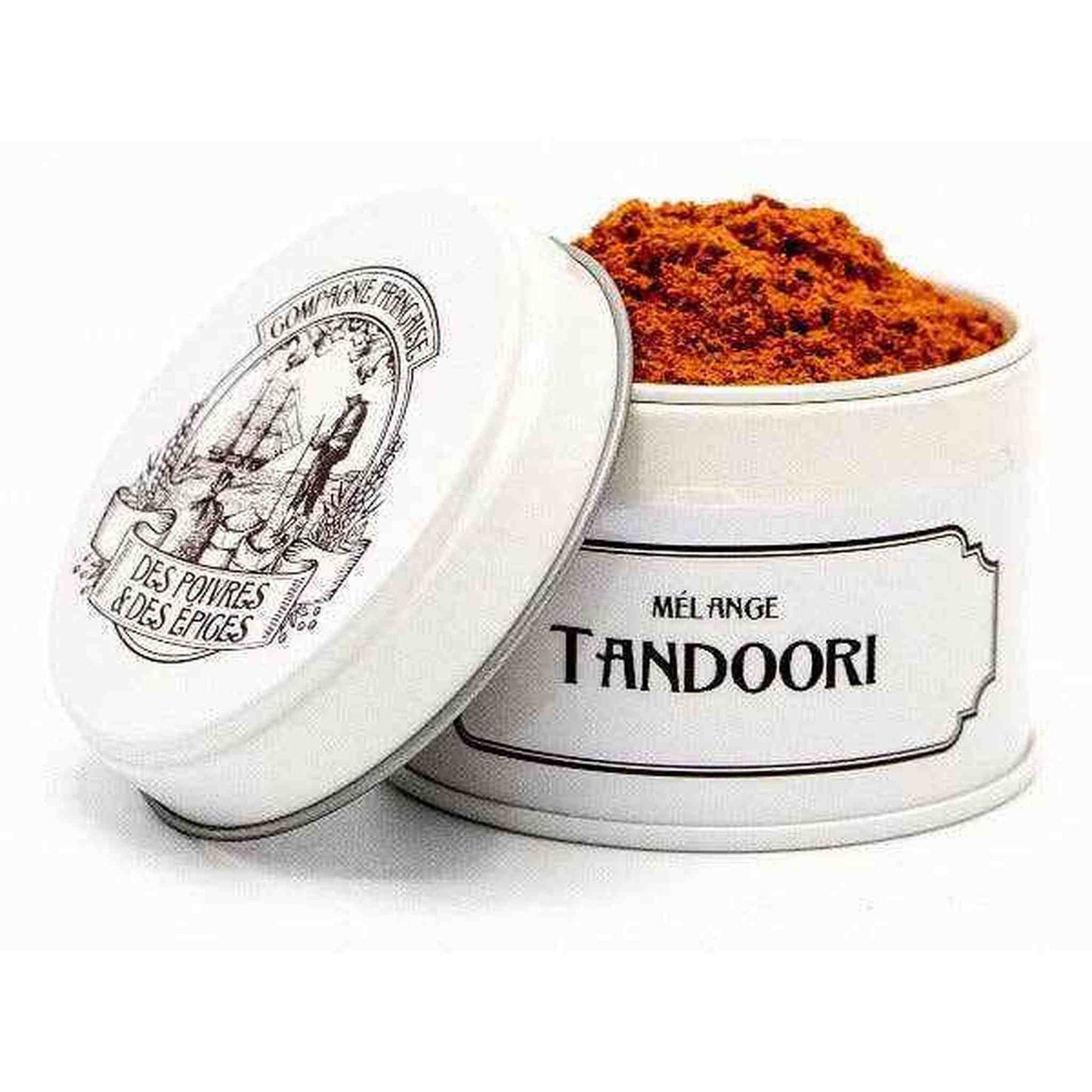 Tin container of Tandoori mix spice blend with vibrant red powder inside for Indian cooking