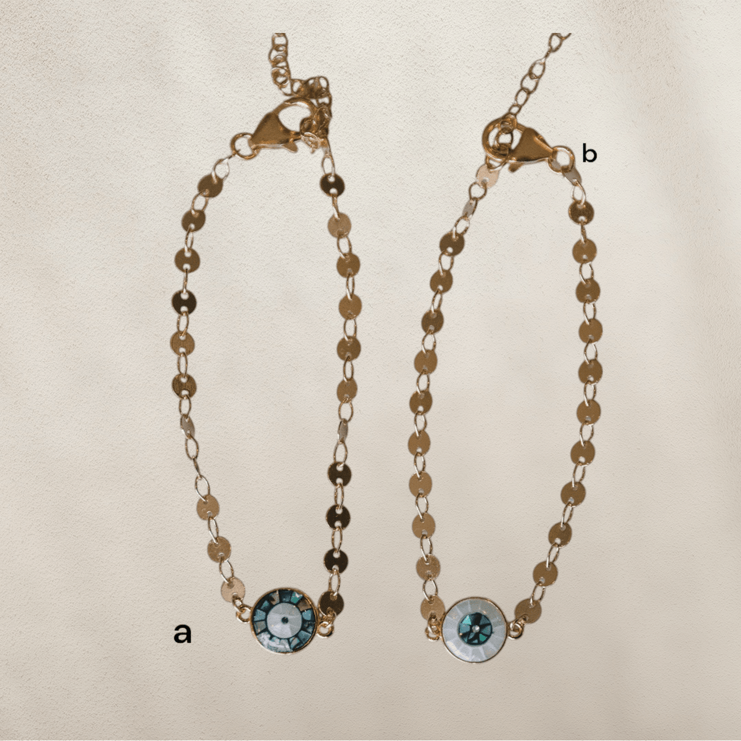 The Disco Evil Eye Bracelet gold-filled chain with 24k gold-filled opal shell eye charm adjustable lobster clasp closure